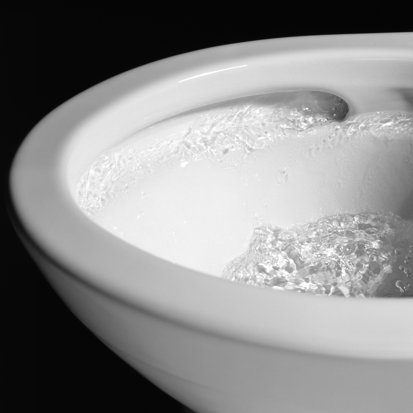 Nexus One-Piece Elongated 1.28 GPF Universal Height Toilet with CEFIONTECT and SS124 SoftClose Seat